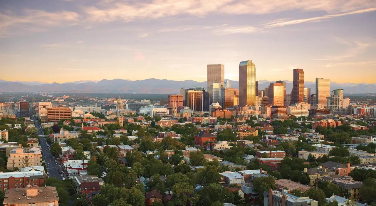 Aerial view of a Colorado city skyline, representing the market served by real estate wholesalers in Colorado